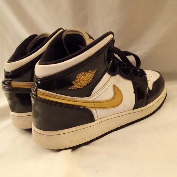 nike air jordan 1 mid patent black white gold